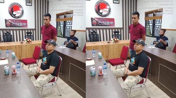 tribun Oknum TNI Bawa Sabu:Pratu RH (kiri) dan Sertu YT (kanan) saat menjalankan pemeriksaan di Polda Sumut. Foto: disitat dari Tribunnews.