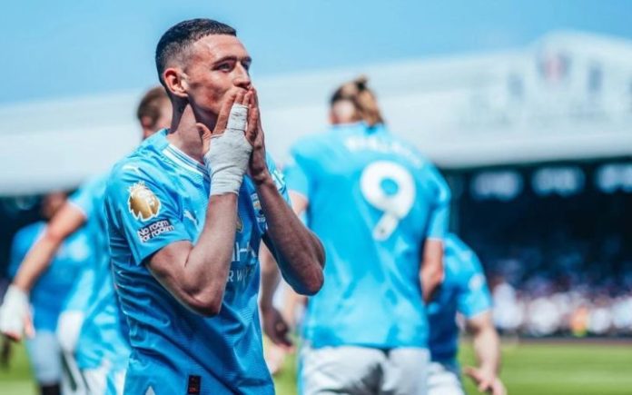 Taklukkan Fulham, City Puncaki Klasemen Liga Inggris Gelandang Manchester City Phil Foden merayakan gol saat menghadapi Fulham, Sabtu (11/5/2024). Foto: Manchester City.
