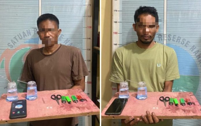 2 Pengedar Sabu Ditangkap di Pidie Jaya, Bandar Masih Diburu Dua orang pengedar narkotika jenis sabu berhasil diamankan oleh Tim Opsnal Sat Resnarkoba Polres Pidie Jaya di Kecamatan Meureudu pada Rabu (12/2/2025).