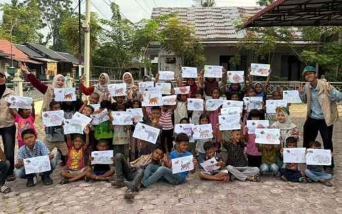 USK (1) Mahasiswa USK Kenalkan 4 Satwa Kunci TNGL Kepada Bocah Cut Langgien